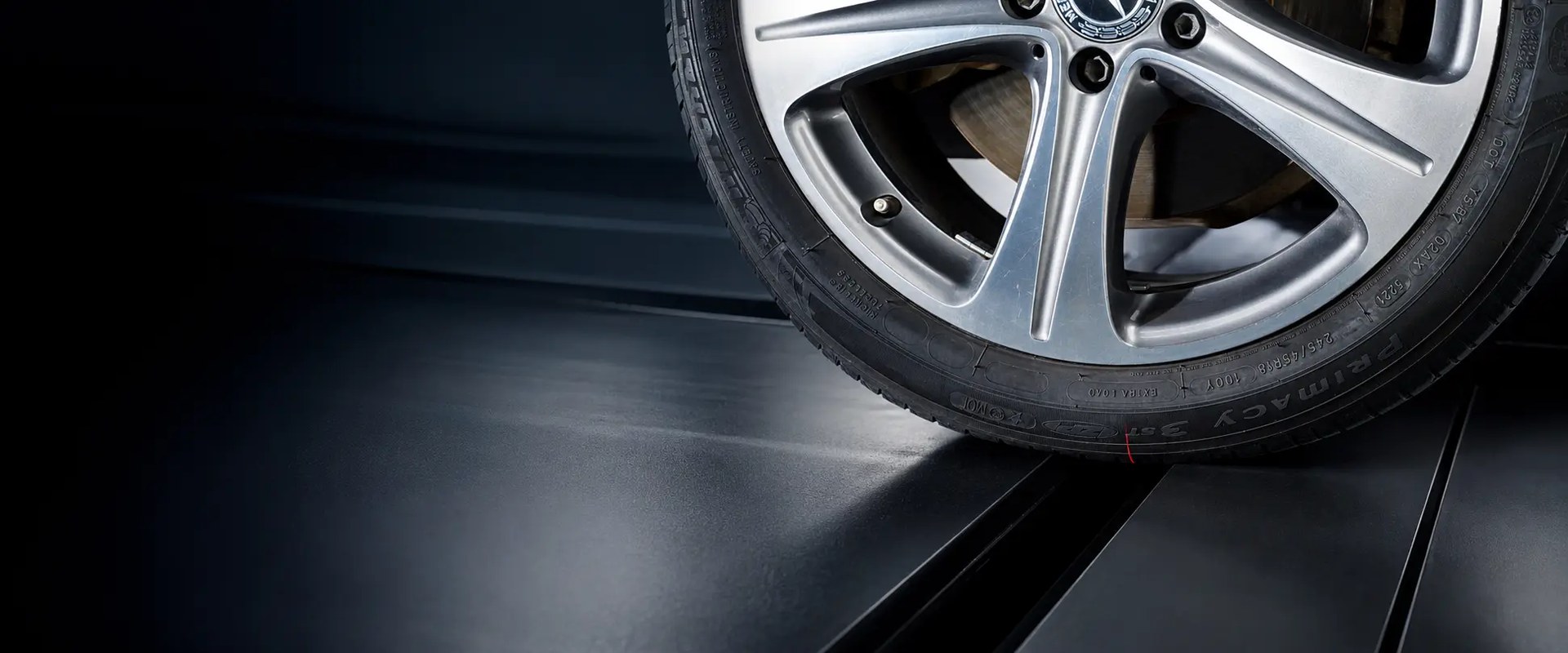 Tire passing above the tread-scanning lane